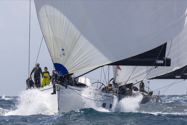 Jean-Pierre Dréau's Mylius 60 Lady First 3 blasts downwind. Photo: IMA / Studio Borlenghi